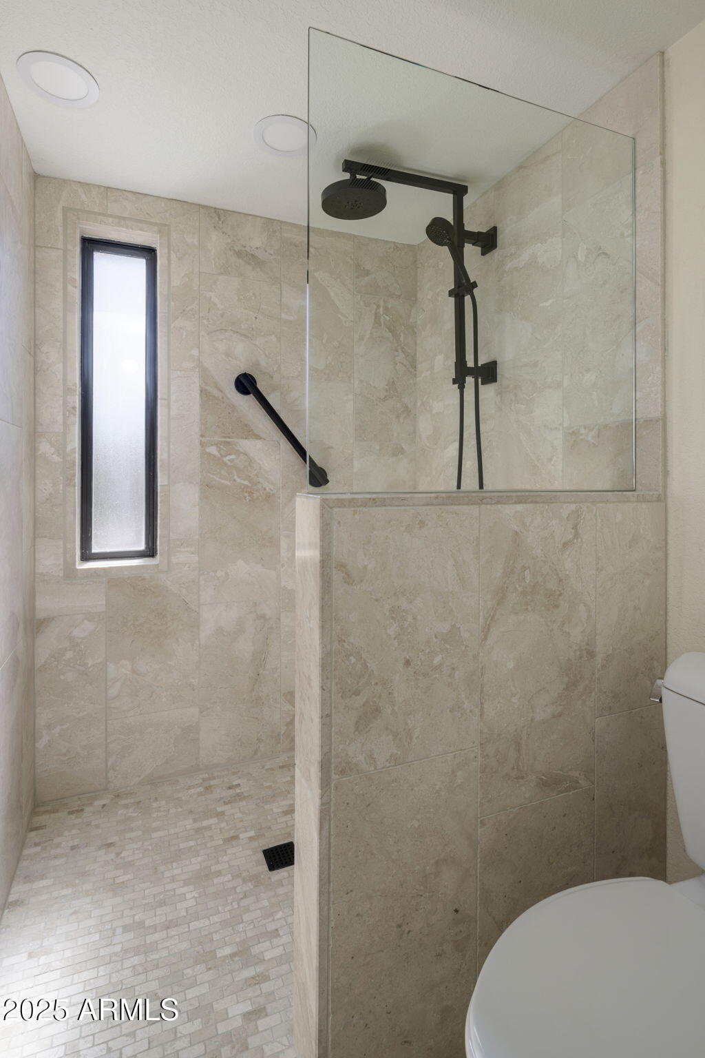 18560 East Horseshoe Bend Rio Verde, AZ 85263 - Photo 23 of 42 a bathroom with a toilet and a shower