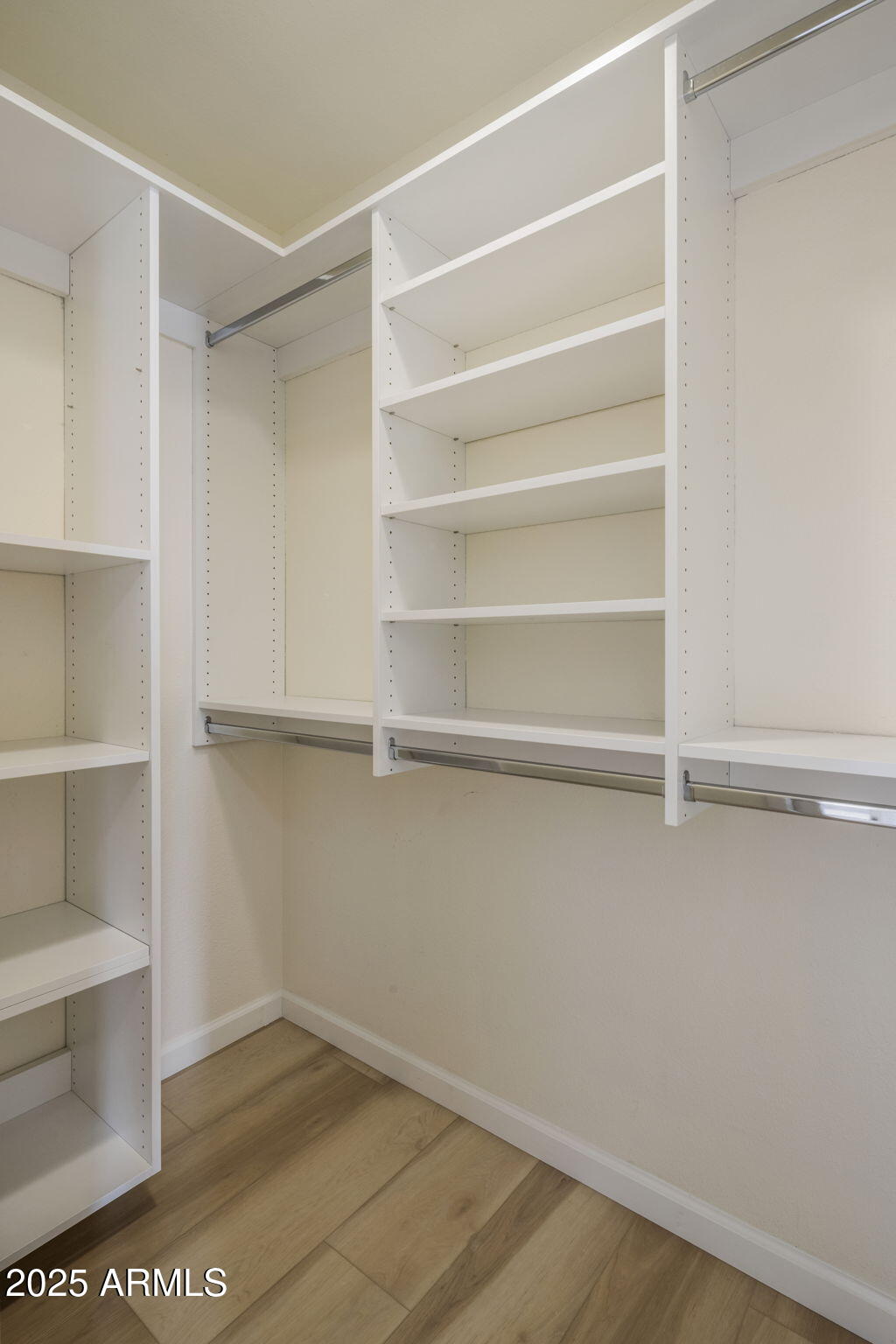 18560 East Horseshoe Bend Rio Verde, AZ 85263 - Photo 24 of 42 a view of walk in closet with empty racks