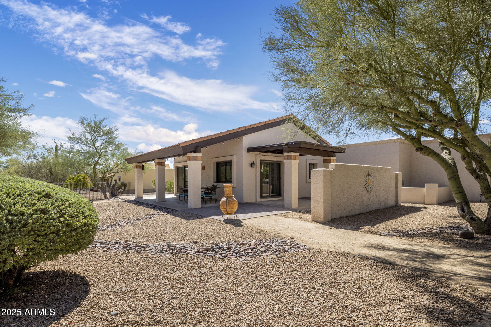 18560 East Horseshoe Bend Rio Verde, AZ 85263 - Photo 32 of 42 a view of a house with a tree in the background
