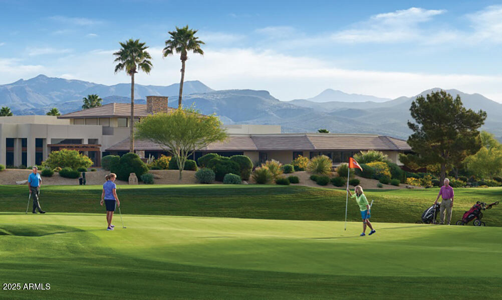 18560 East Horseshoe Bend Rio Verde, AZ 85263 - Photo 41 of 42 a view of a golf course with a house