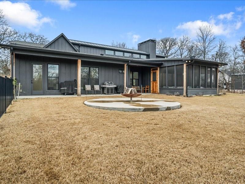 8701 Zebra Crossing Larue, TX 75770 - Photo 36 of 39 Backside of home with fire pit and hot tub