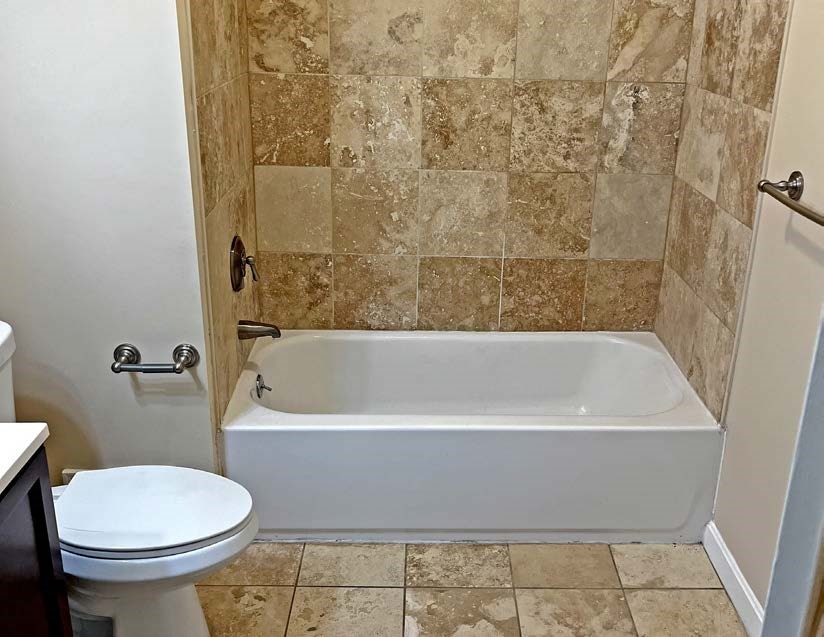 3106-3110 Washington Street Boston, MA 02119 - Photo 14 of 16 a bathroom with a sink and a toilet