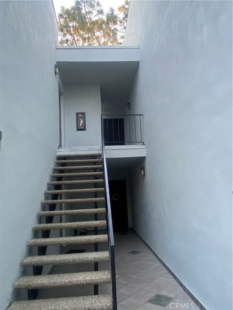 18645 Hatteras Street, Unit 278 Tarzana, CA 91356 - Photo 17 of 37 a view of entryway and hall with wooden floor