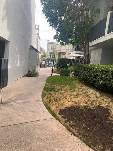 a view of a street with houses