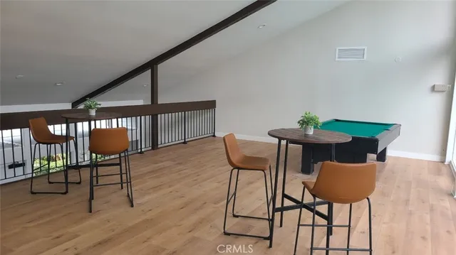 a balcony and view of an chairs