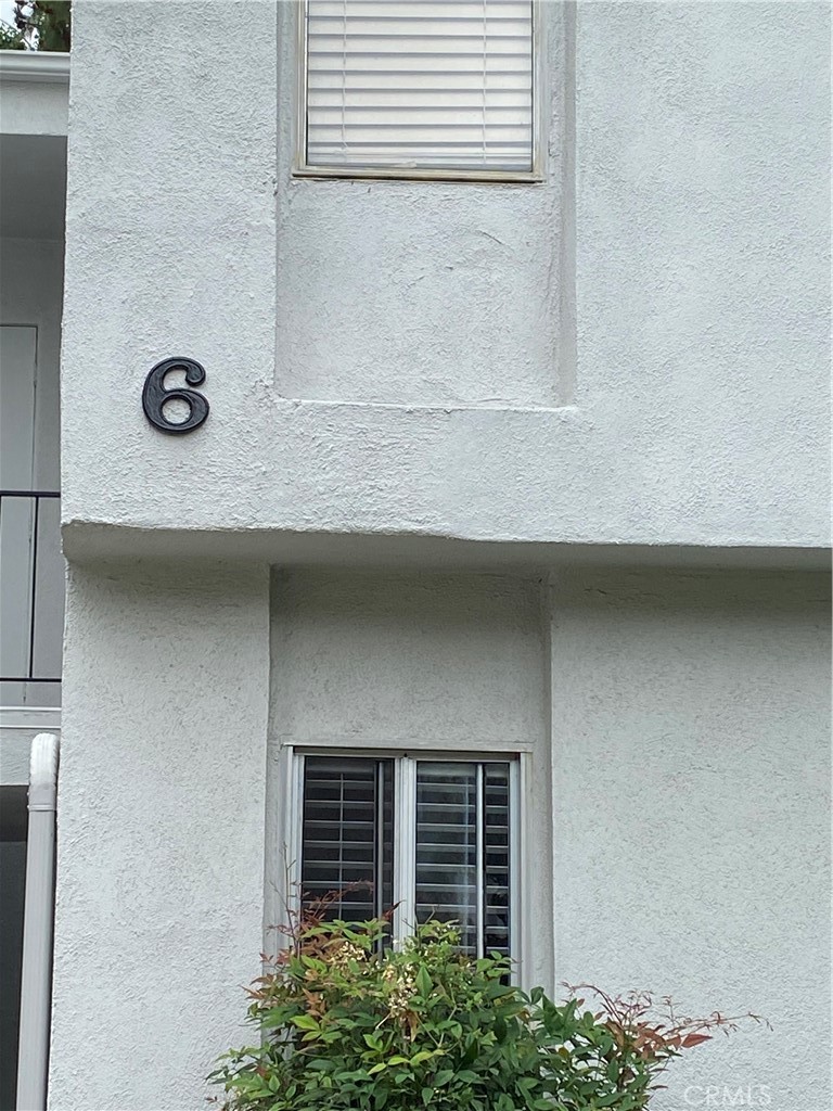 18645 Hatteras Street, Unit 278 Tarzana, CA 91356 - Photo 37 of 37 a front door view of a house