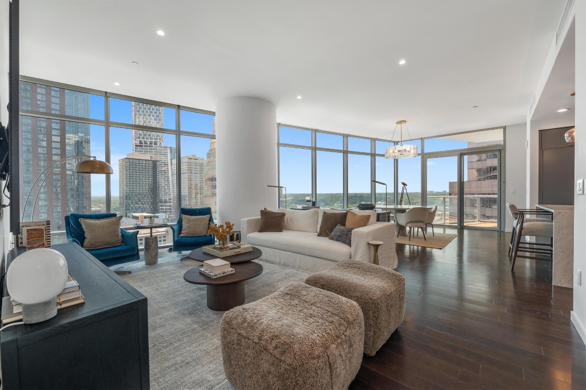 200 Congress Avenue, Unit 19F Austin, TX 78701 - Photo 1 of 40 a living room with furniture and a large window