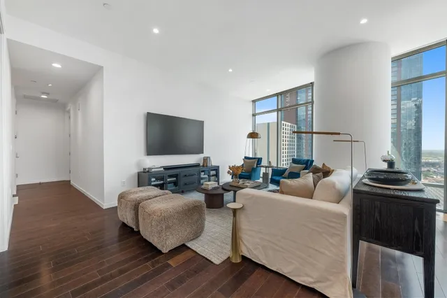a view of storage and utility room with wooden floor