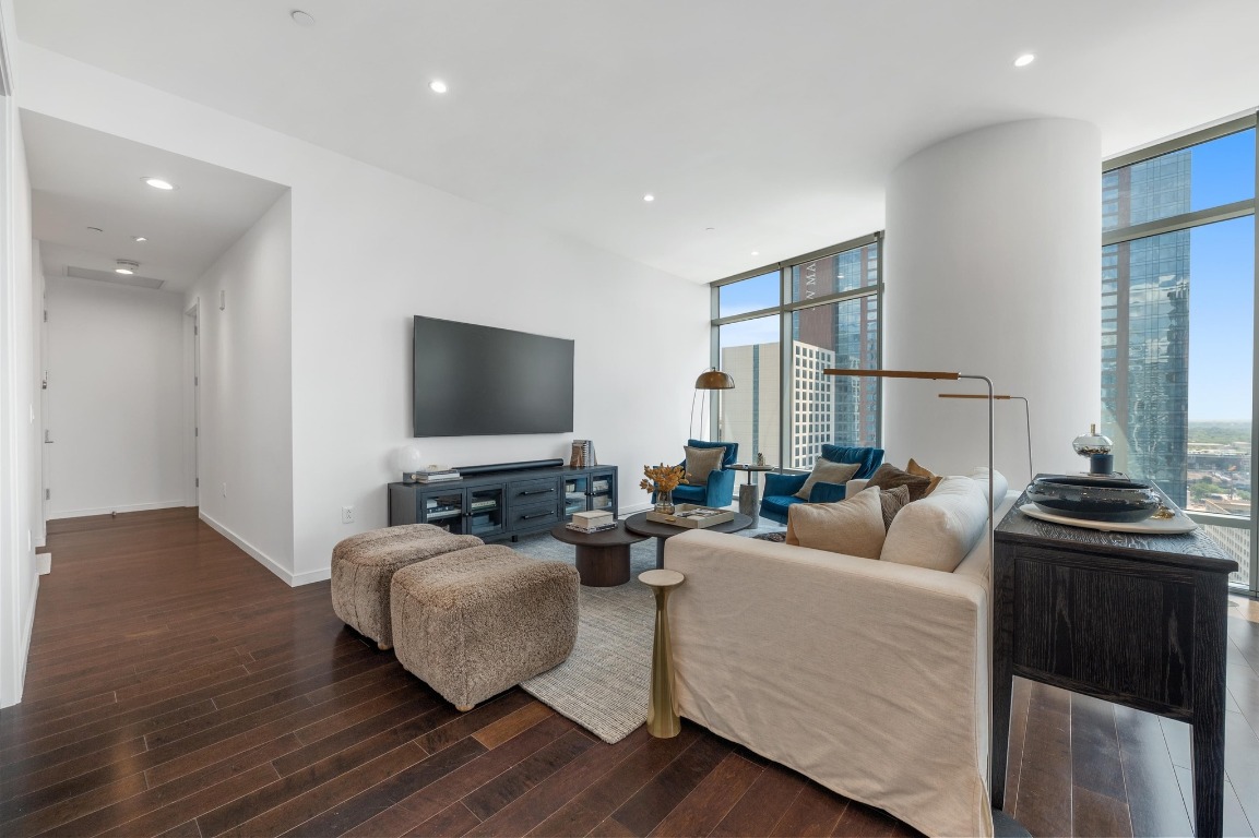 200 Congress Avenue, Unit 19F Austin, TX 78701 - Photo 15 of 40 a living room with furniture and a flat screen tv