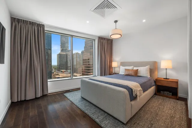 a room with furniture and wooden floor