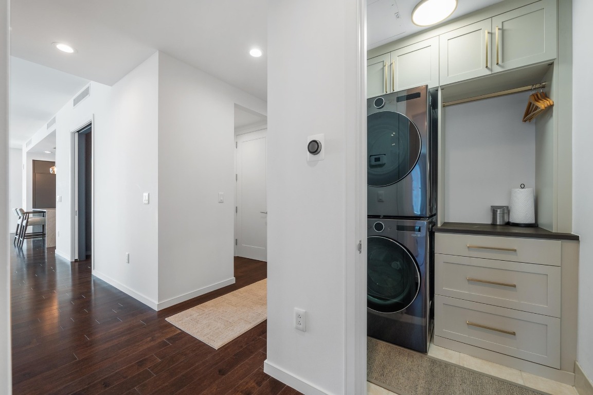 200 Congress Avenue, Unit 19F Austin, TX 78701 - Photo 28 of 40 a view of walk in closet with clothes and shoes
