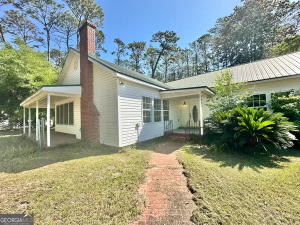 a view of a house with a patio