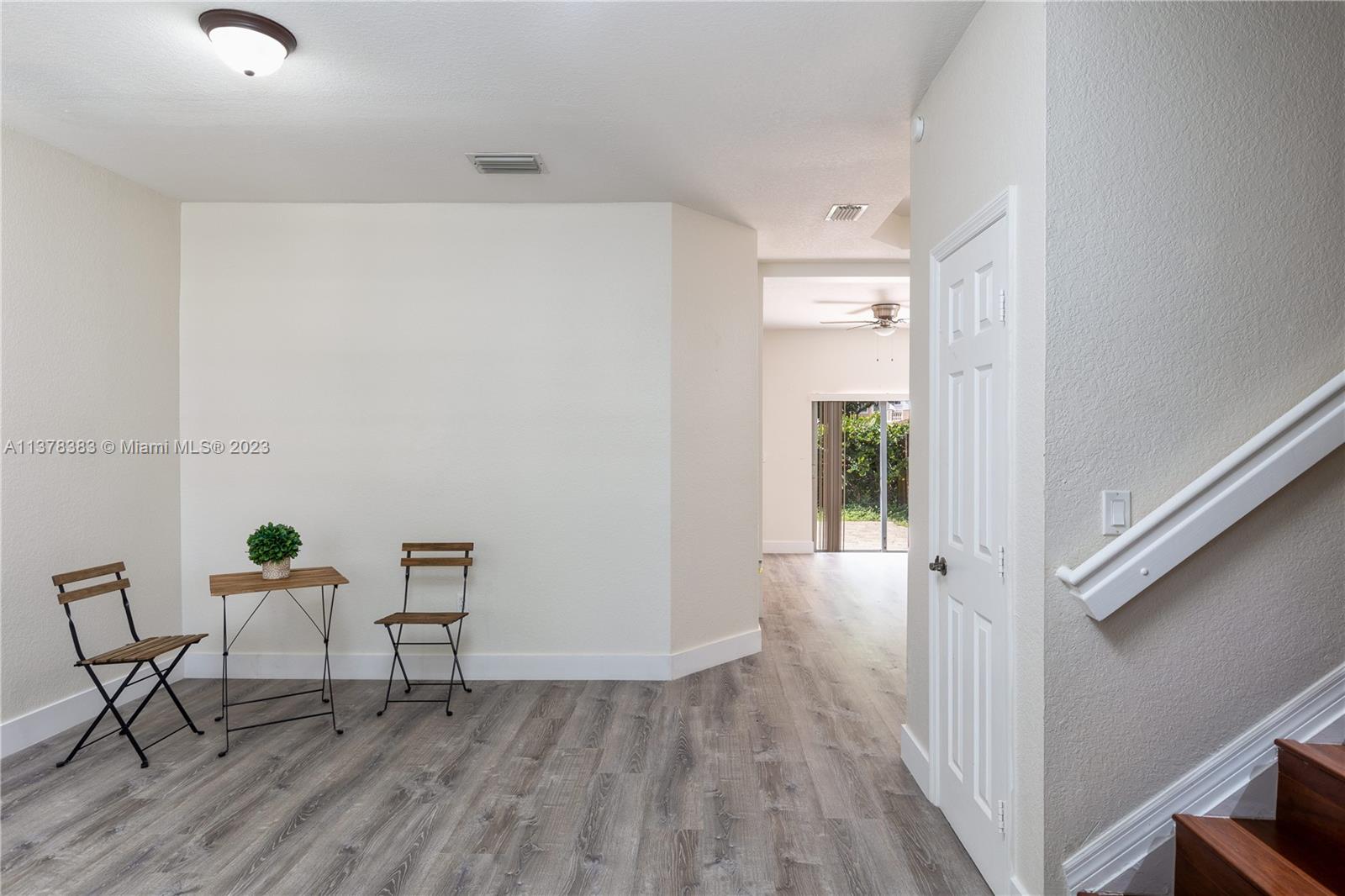 Vizcaya Miramar, FL 33027 - Photo 13 of 35 a view of a room with wooden floor lounge chair and windows