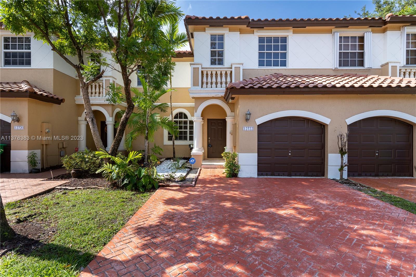 Vizcaya Miramar, FL 33027 - Photo 2 of 35 a front view of a house with a garden