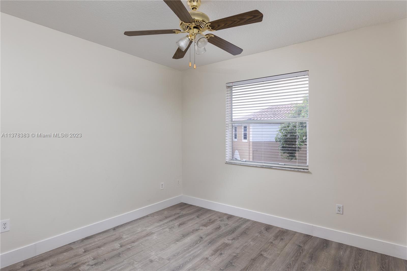 Vizcaya Miramar, FL 33027 - Photo 21 of 35 an empty room with a window and a fan
