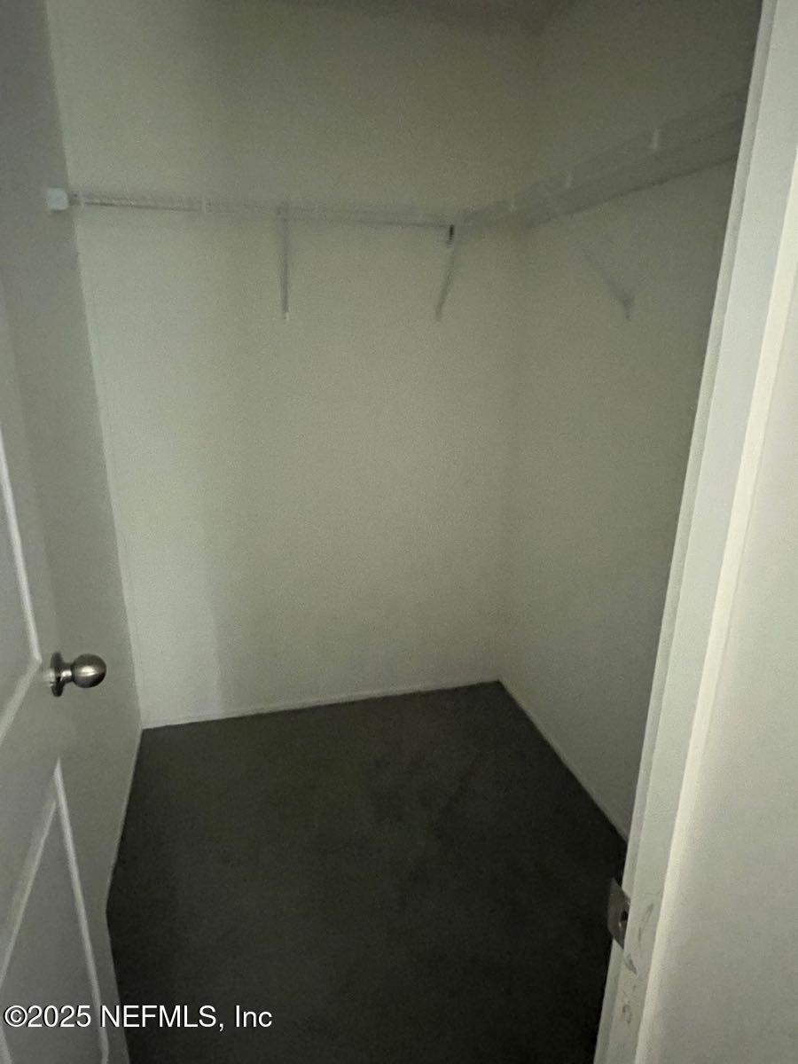 540324 Lem Turner Road Callahan, FL 32011 - Photo 19 of 25 an empty room with a wooden door