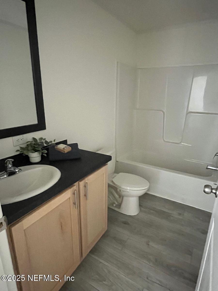 540324 Lem Turner Road Callahan, FL 32011 - Photo 22 of 25 a bathroom with a sink and a mirror