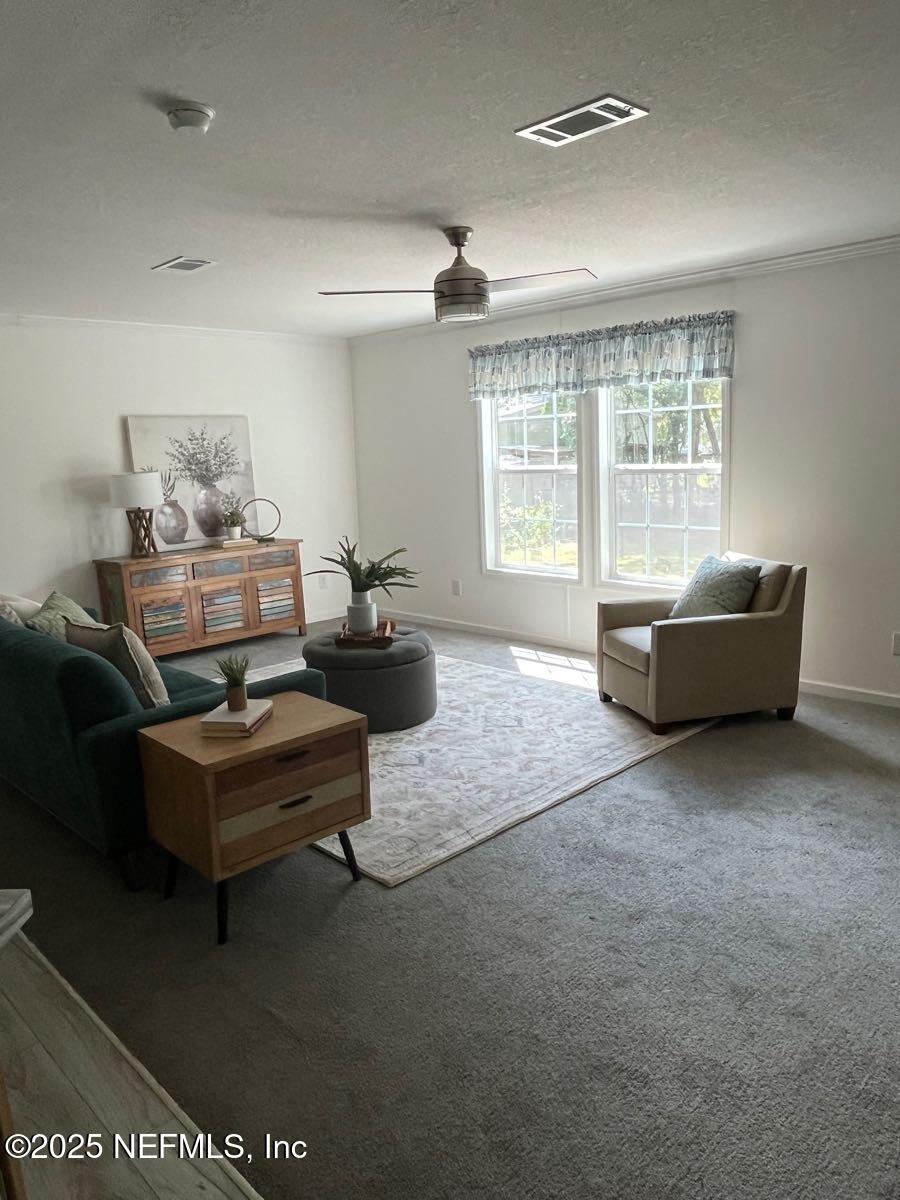540324 Lem Turner Road Callahan, FL 32011 - Photo 3 of 25 a living room with furniture and a large window