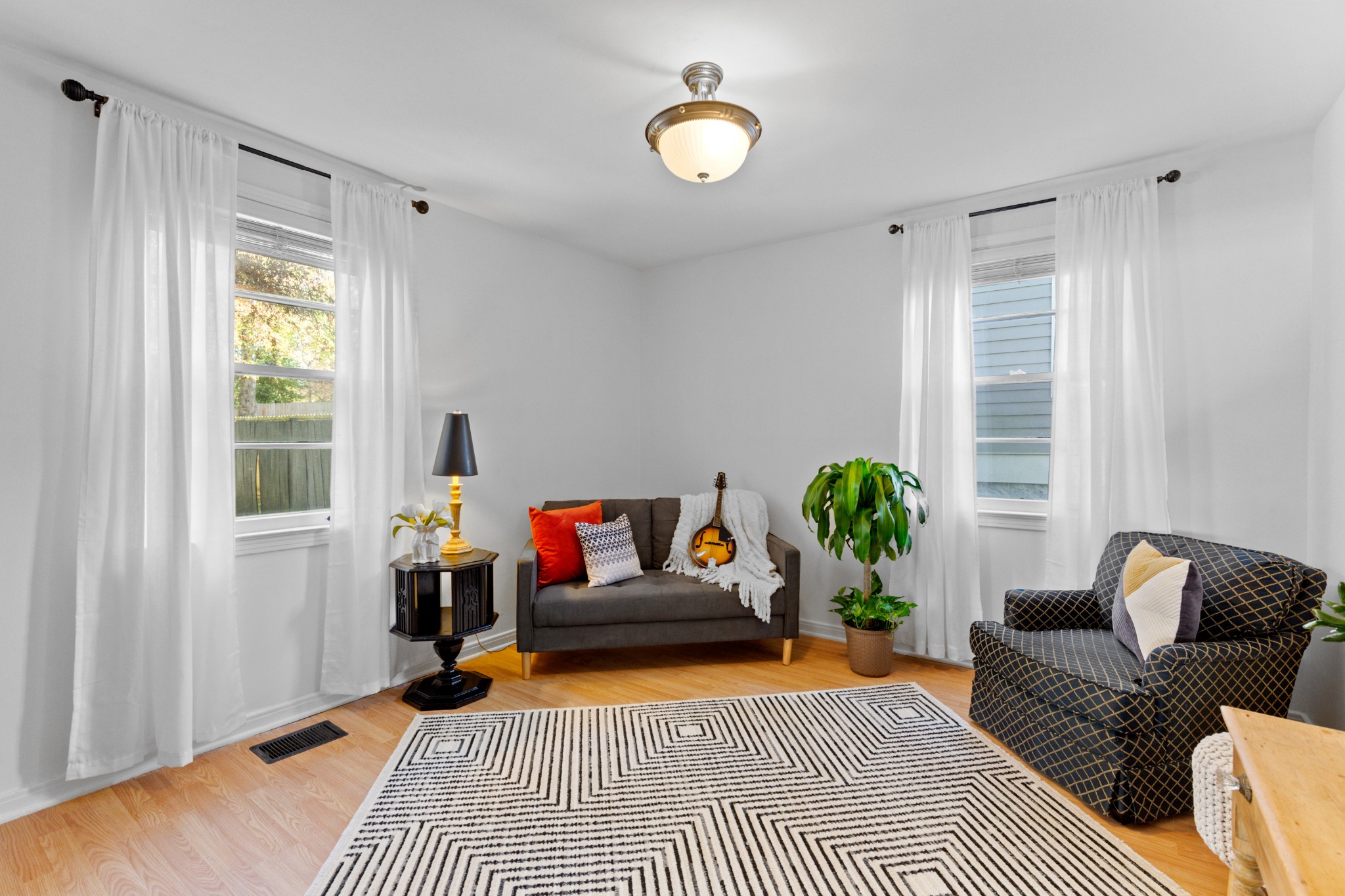 2009 Overby Road Nashville, TN 37207 - Photo 15 of 20 a living room with furniture and a potted plant