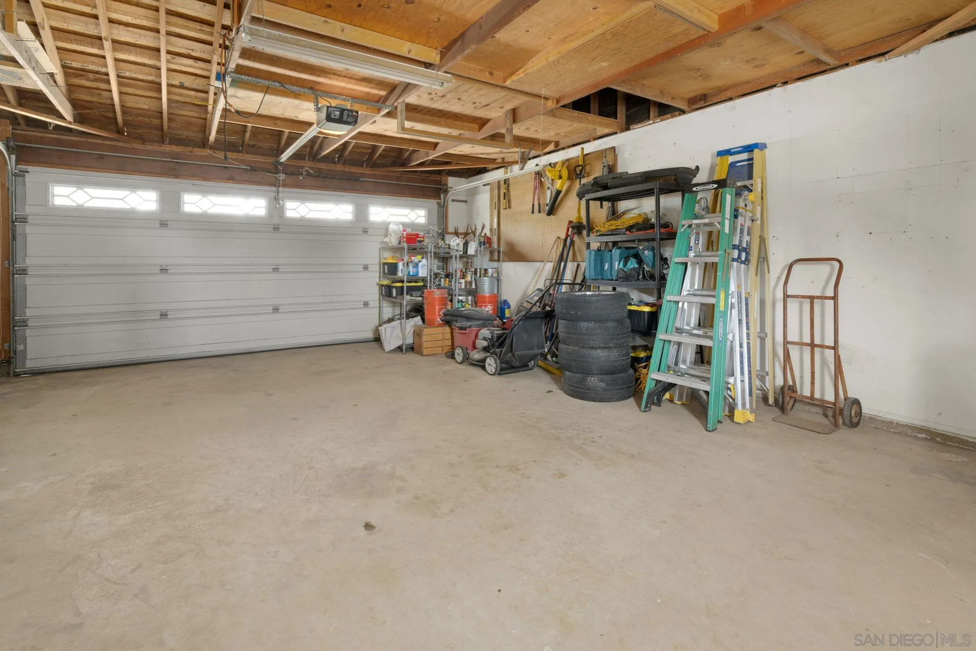 913 Buena Rosa Court Fallbrook, CA 92028 - Photo 25 of 45 a view of a garage with storage