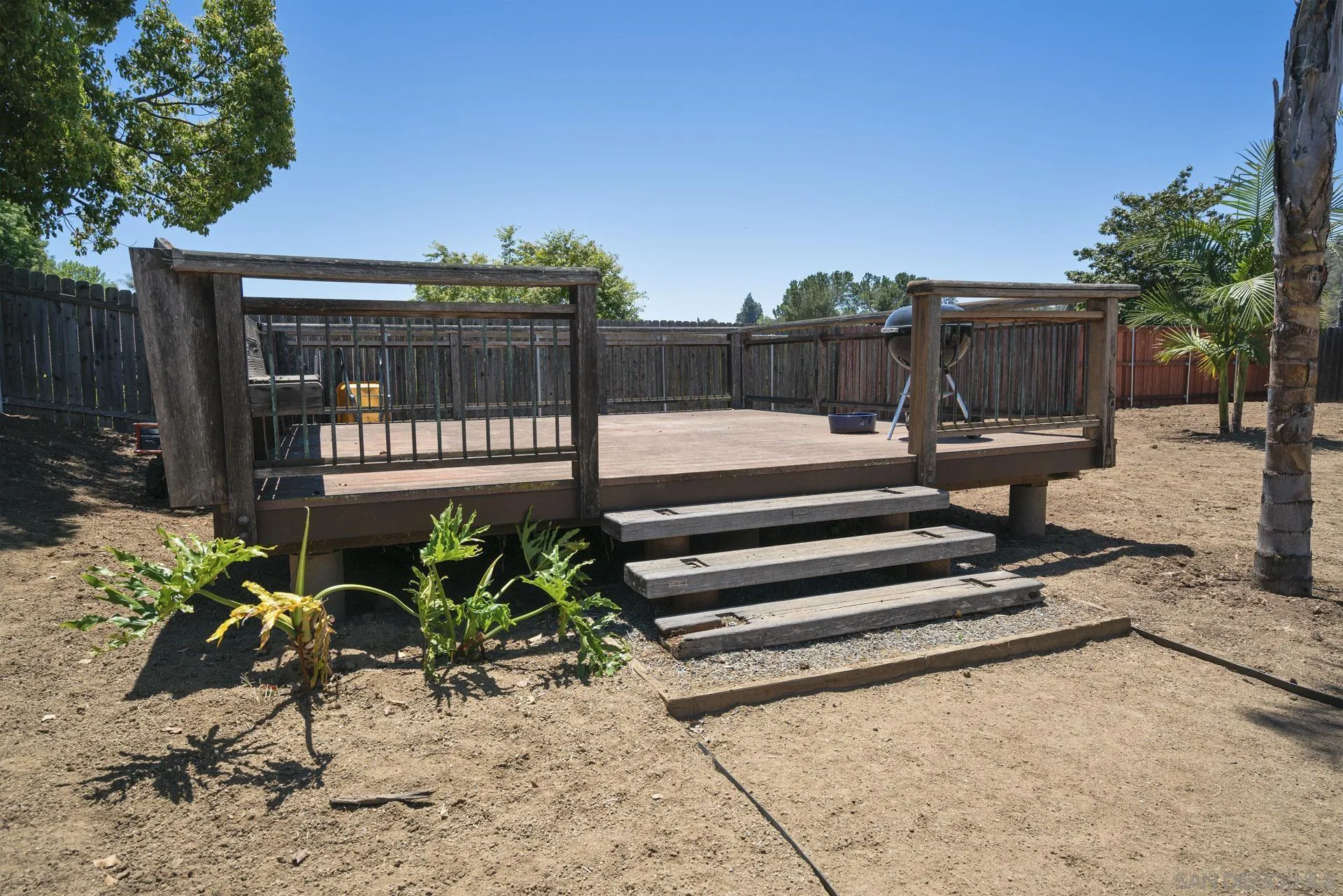913 Buena Rosa Court Fallbrook, CA 92028 - Photo 30 of 45 a view of a backyard with sitting area