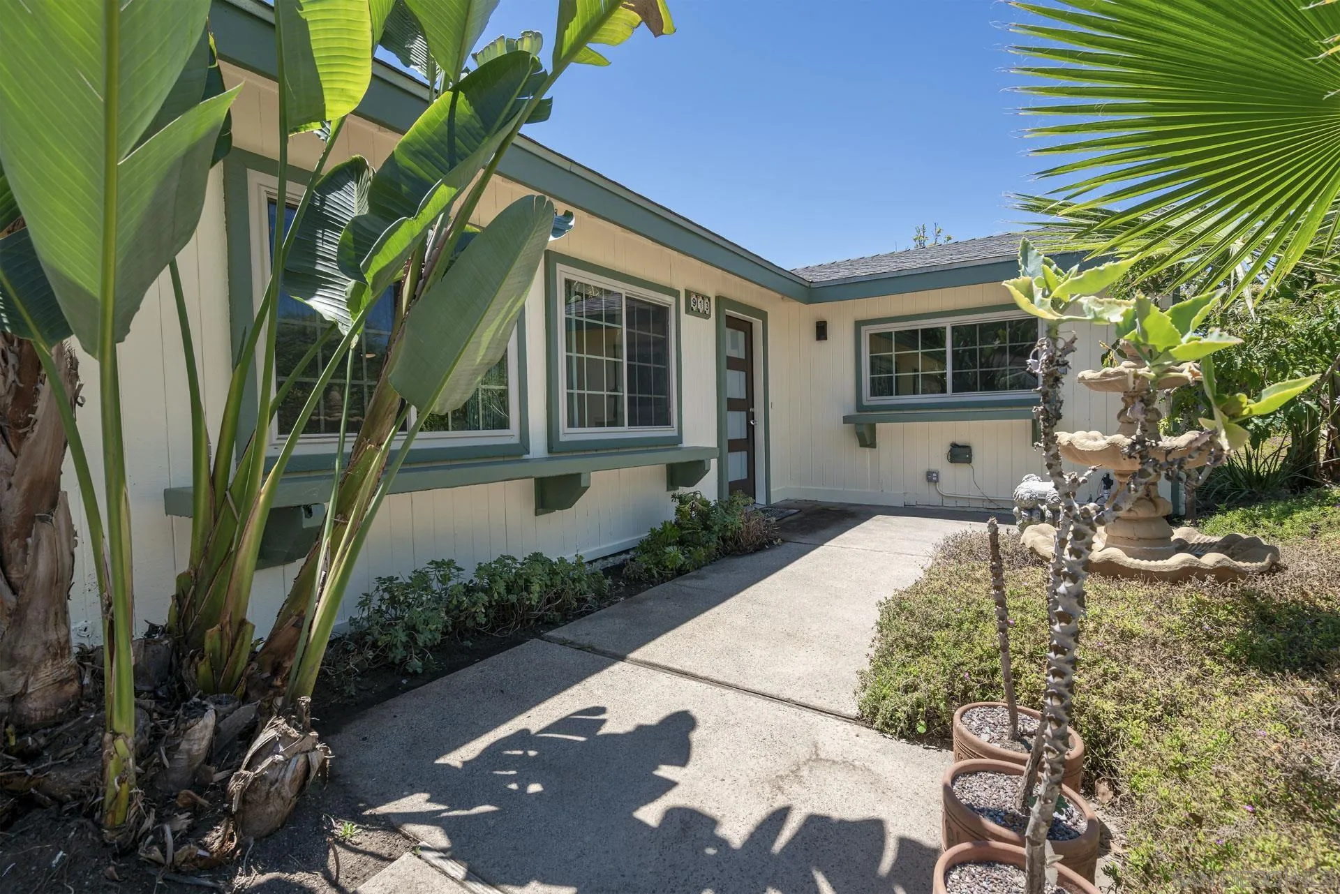 913 Buena Rosa Court Fallbrook, CA 92028 - Photo 3 of 45 a view of a house with backyard and sitting area