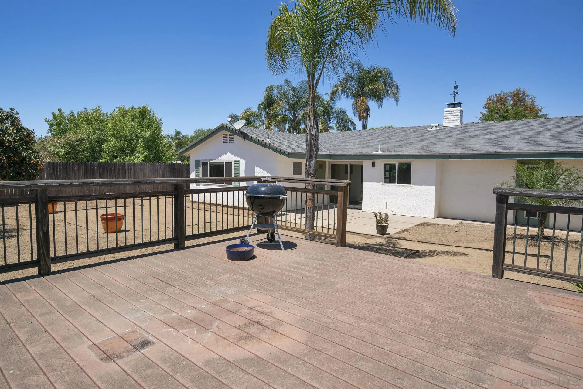 913 Buena Rosa Court Fallbrook, CA 92028 - Photo 31 of 45 a view of a house with backyard and sitting area