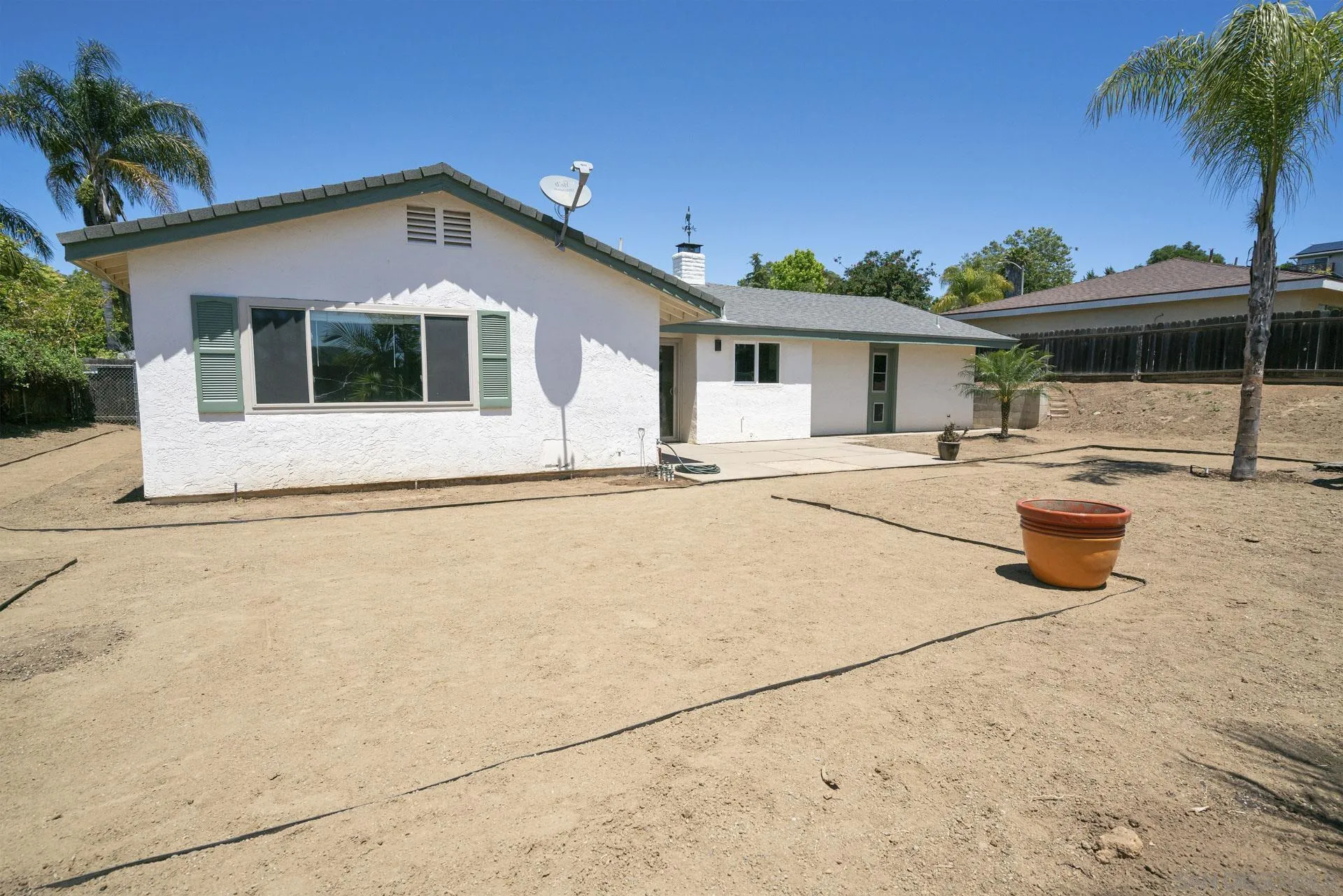 913 Buena Rosa Court Fallbrook, CA 92028 - Photo 35 of 45 a front view of a house with a yard