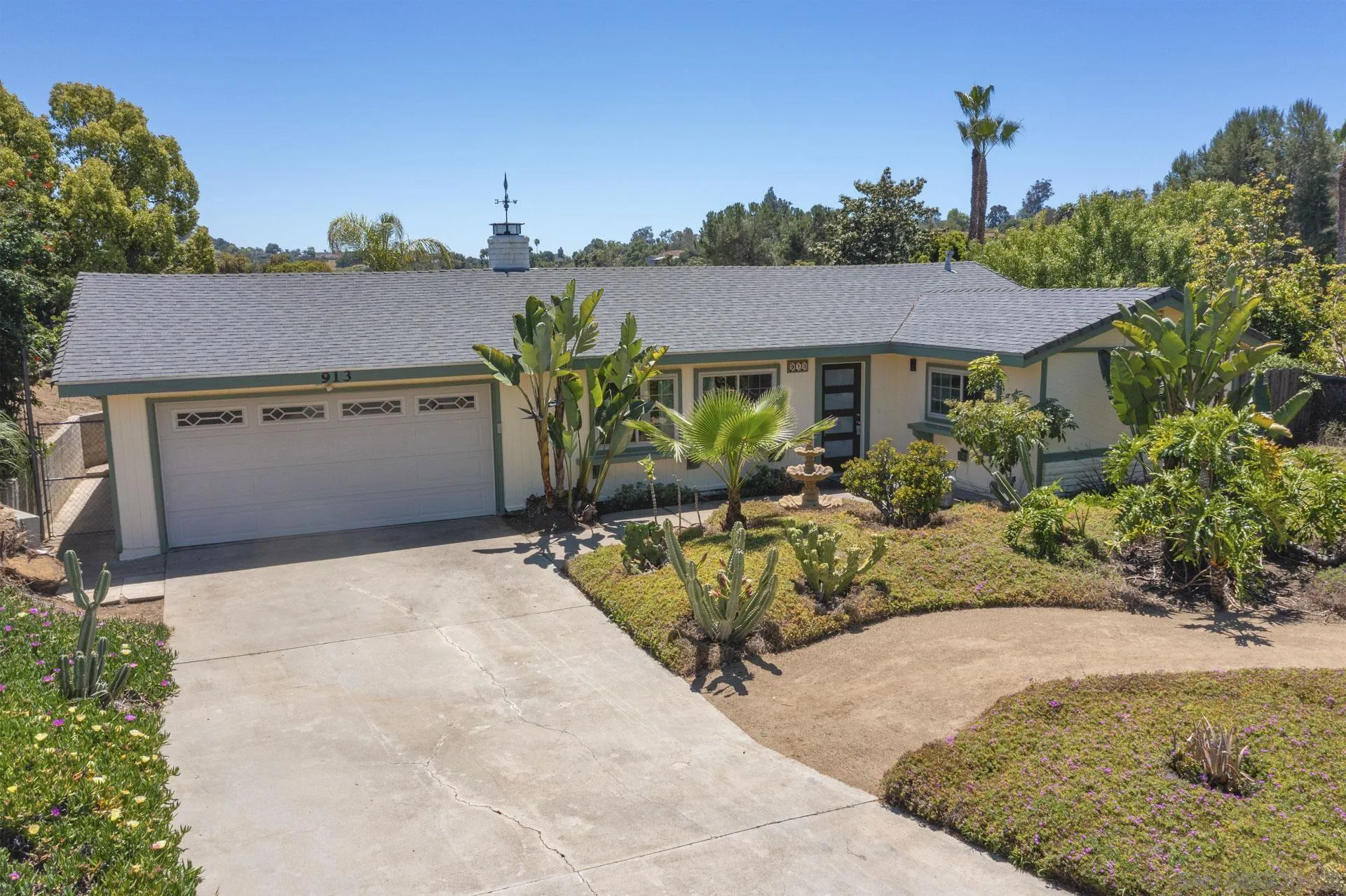 913 Buena Rosa Court Fallbrook, CA 92028 - Photo 40 of 45 front view of a house with a yard