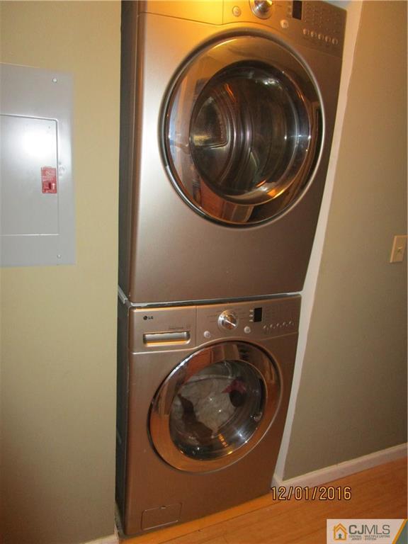 737 Edpas Road, Unit 737 New Brunswick, NJ 08901 - Photo 14 of 19 a utility room with dryer and washer