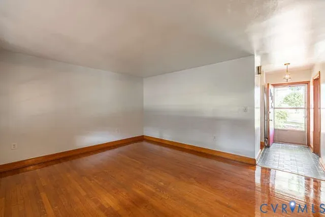 a view of an empty room and window