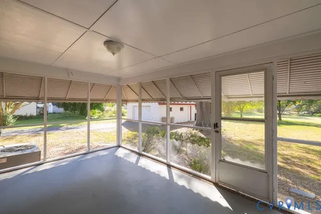 a view of a room with a large window