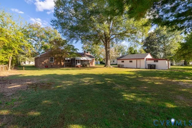 a view of a house with a big yard