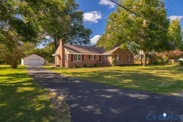 a view of house with outdoor space