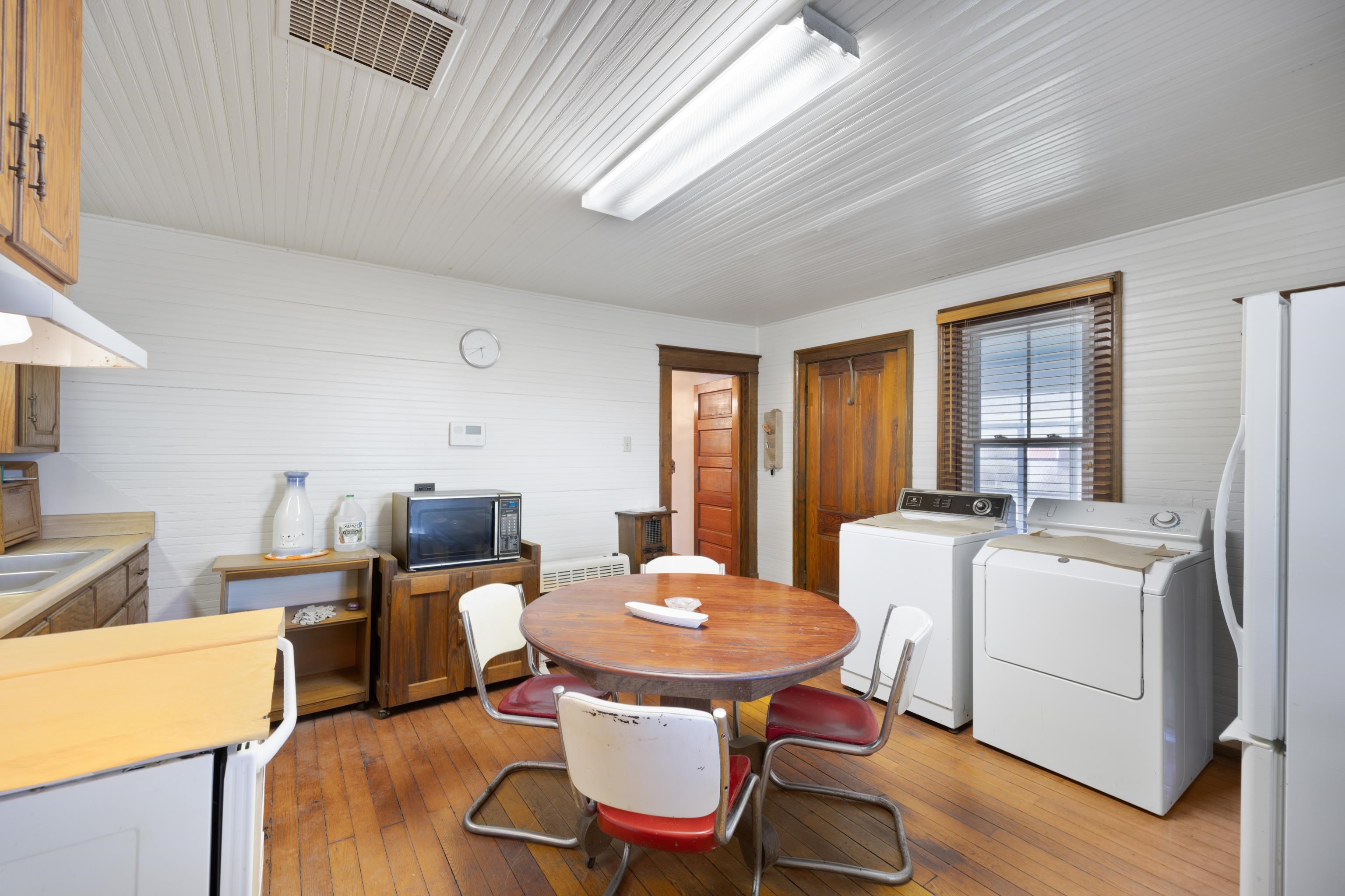 3165 Old Greenville Road Staunton, VA 24401 - Photo 21 of 66 a view of a dining room with furniture window and wooden floor