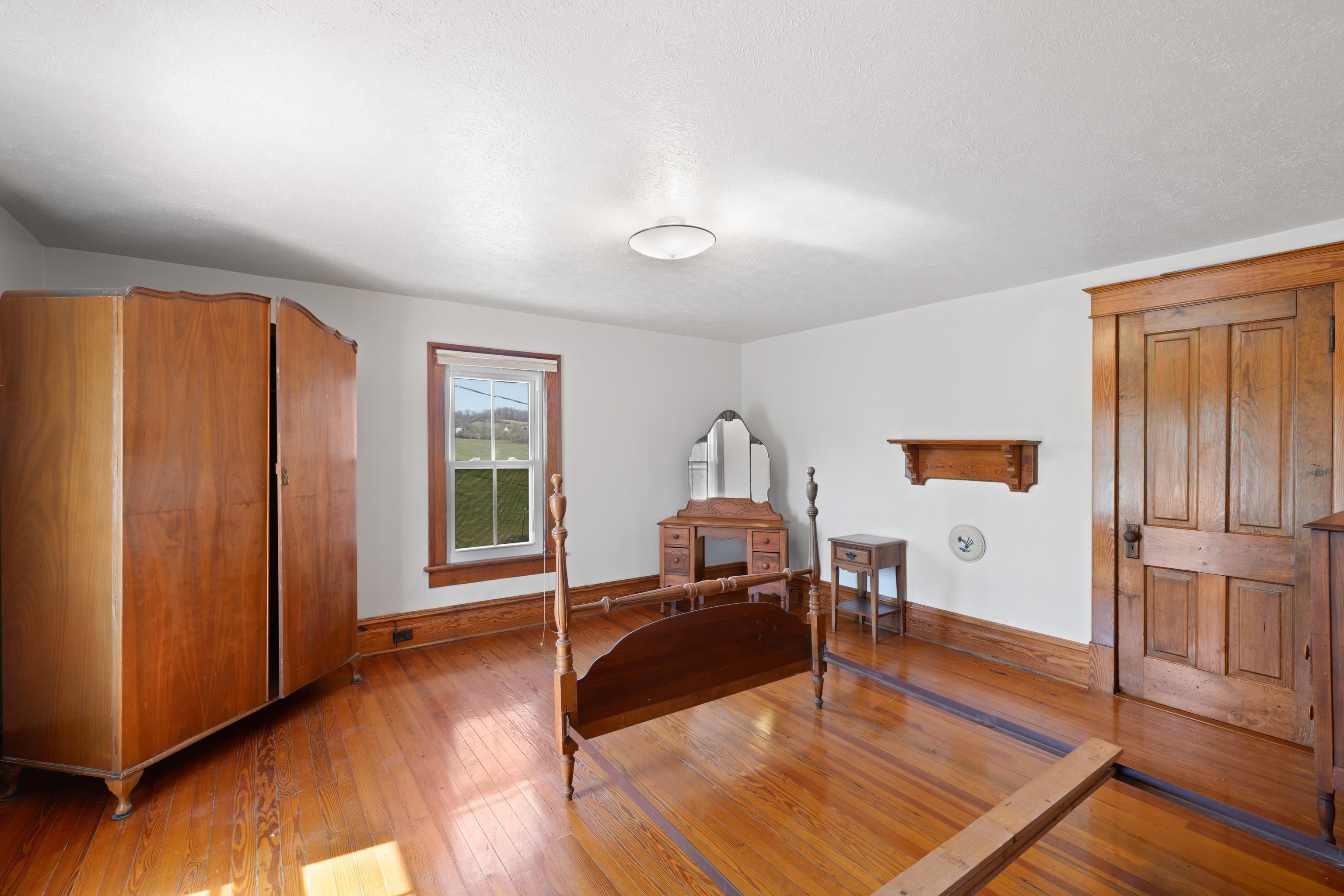 3165 Old Greenville Road Staunton, VA 24401 - Photo 36 of 66 a living room with furniture and a window