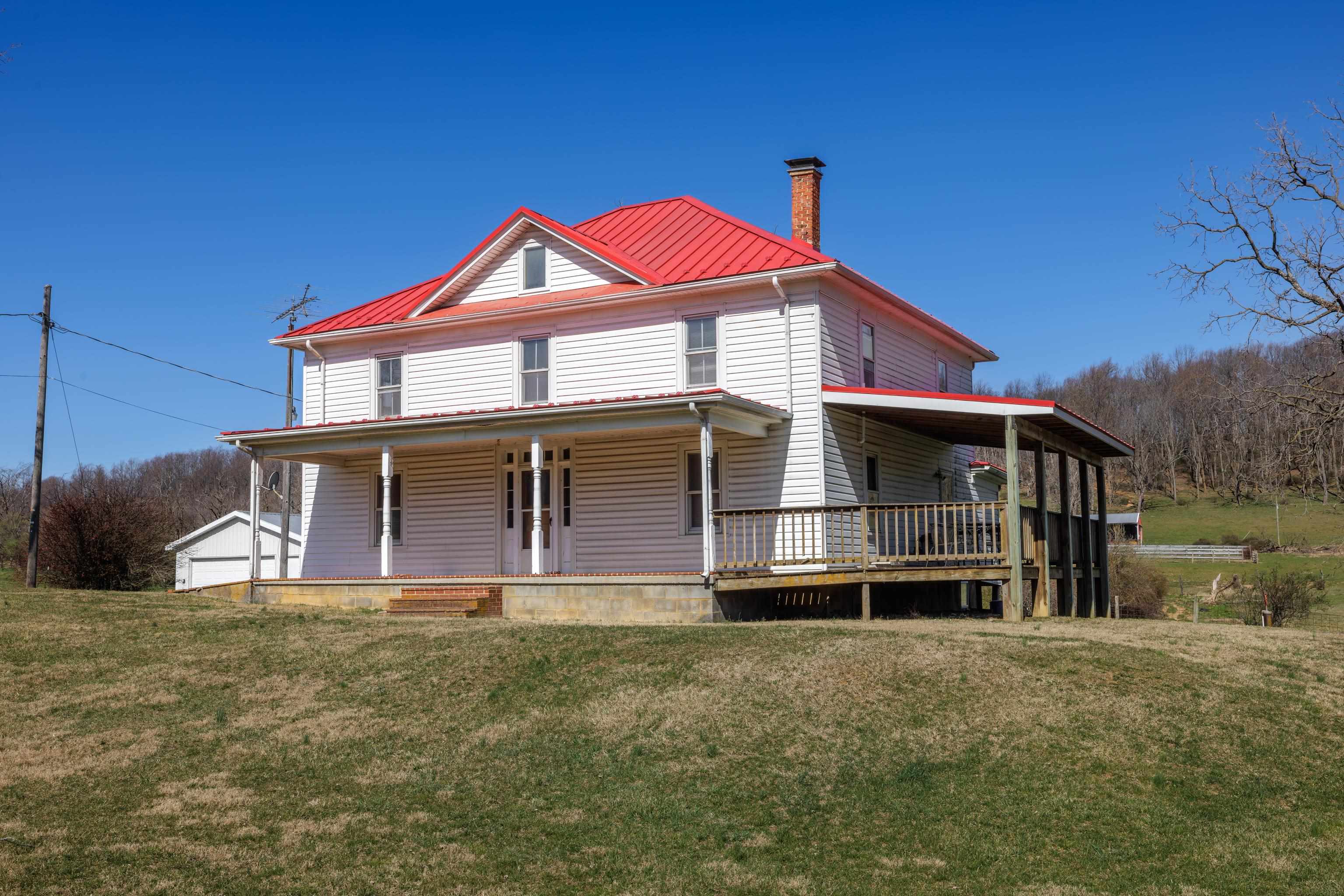 3165 Old Greenville Road Staunton, VA 24401 - Photo 4 of 66 a front view of a house with a yard