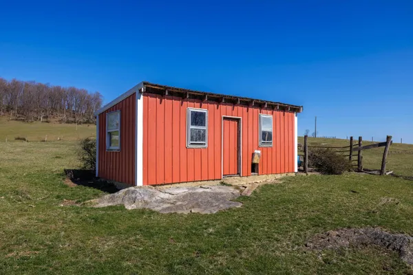 a view of an ocean and mountain