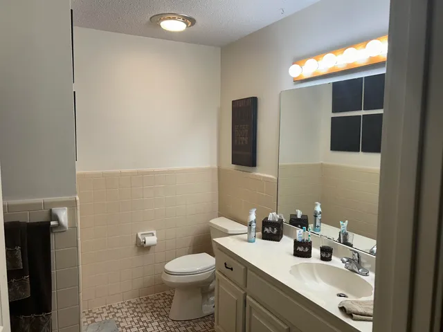 a bathroom with a sink and a toilet