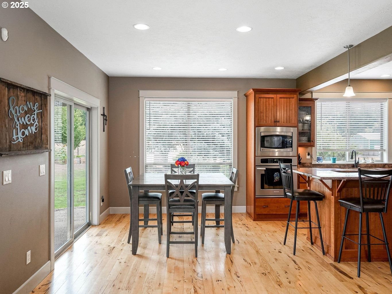 40893 Elk Ridge Lane Stayton, OR 97383 - Photo 14 of 46 a view of a dining room with furniture window and outside view