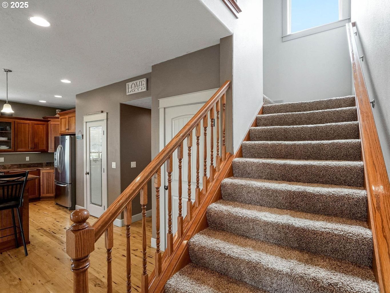 40893 Elk Ridge Lane Stayton, OR 97383 - Photo 23 of 46 a view of entryway with wooden floor and stairs