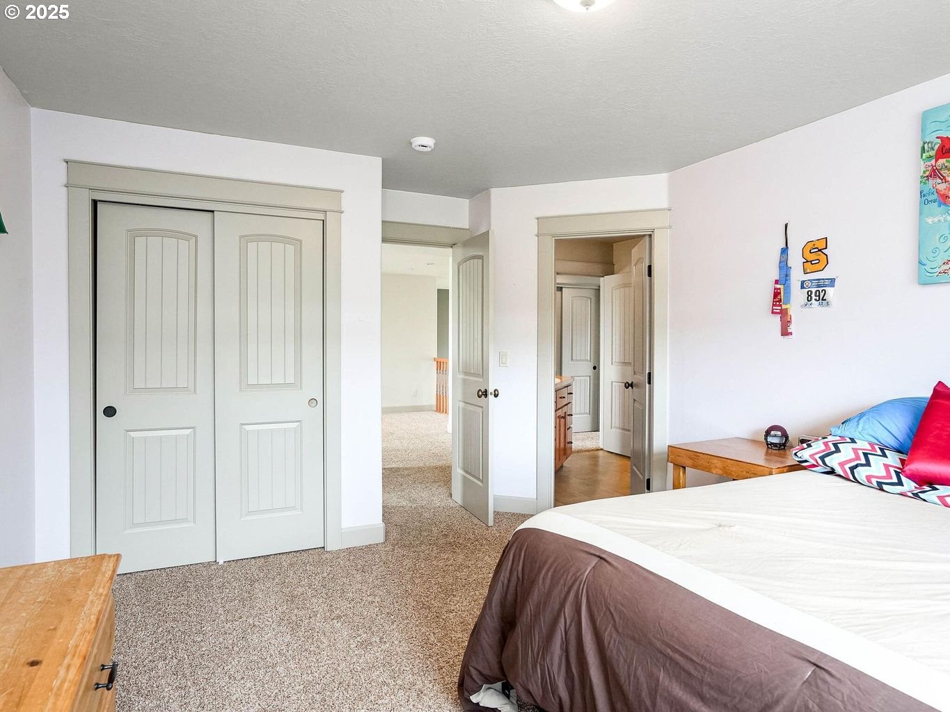 40893 Elk Ridge Lane Stayton, OR 97383 - Photo 26 of 46 a bedroom with a bed and hallway