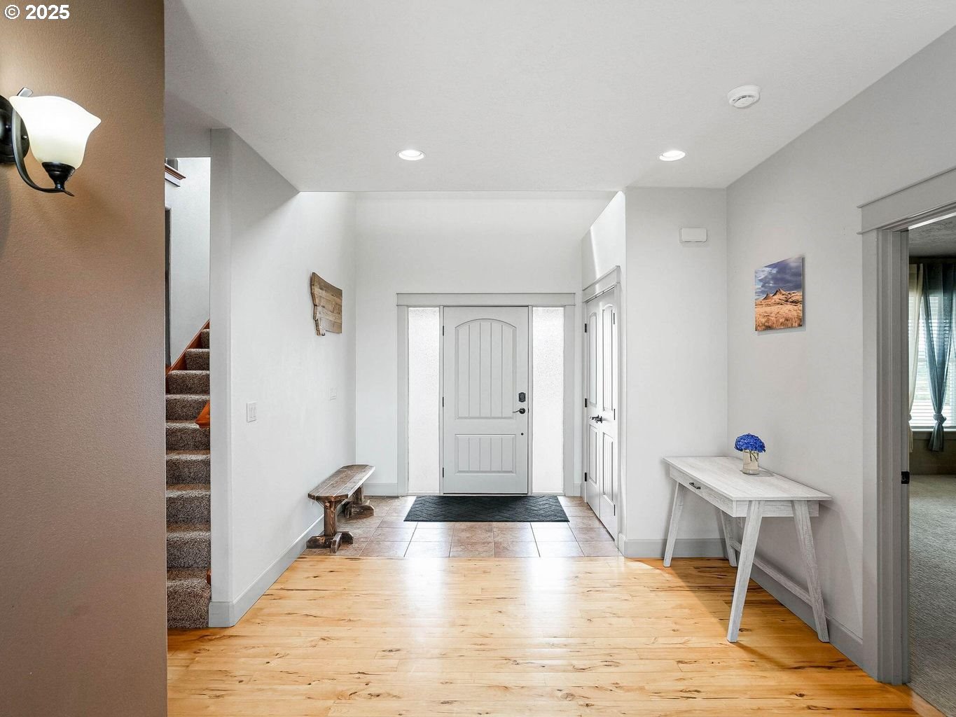 40893 Elk Ridge Lane Stayton, OR 97383 - Photo 6 of 46 a view of a hallway with wooden floor and furniture