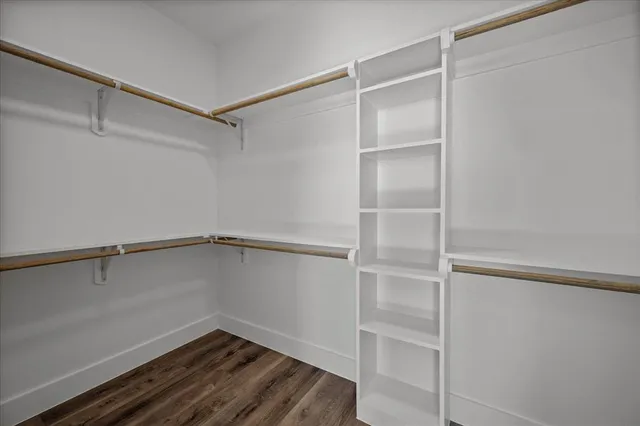 a view of an empty walk in closet