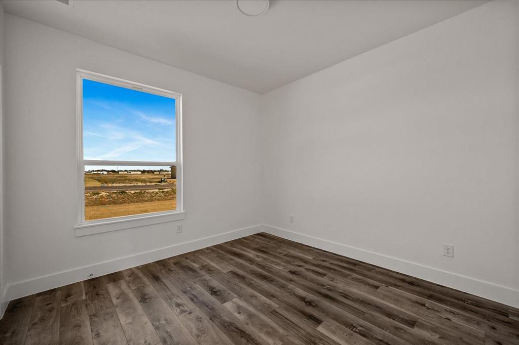 3250 Willow Road Celeste, TX 75423 - Photo 20 of 32 a view of an empty room with a window