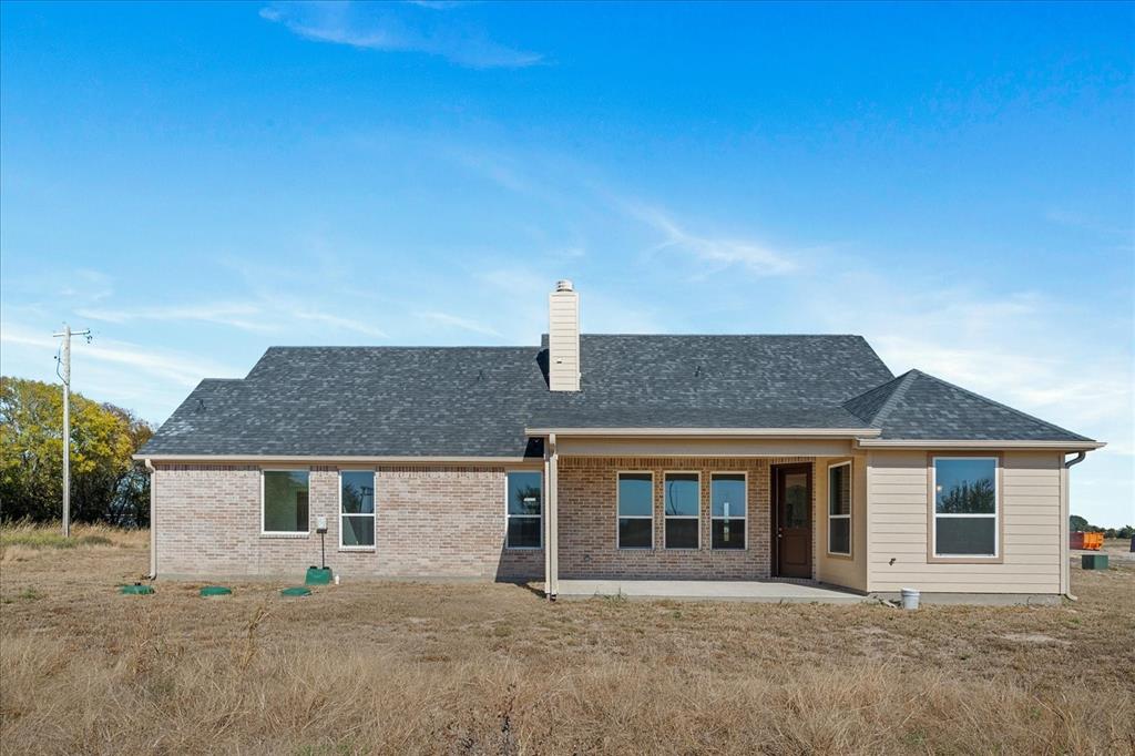 3250 Willow Road Celeste, TX 75423 - Photo 26 of 32 front view of a house with a fence