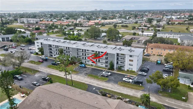an aerial view of a city with lots of residential buildings