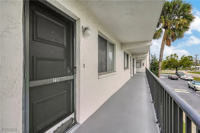 a view of a balcony with city view