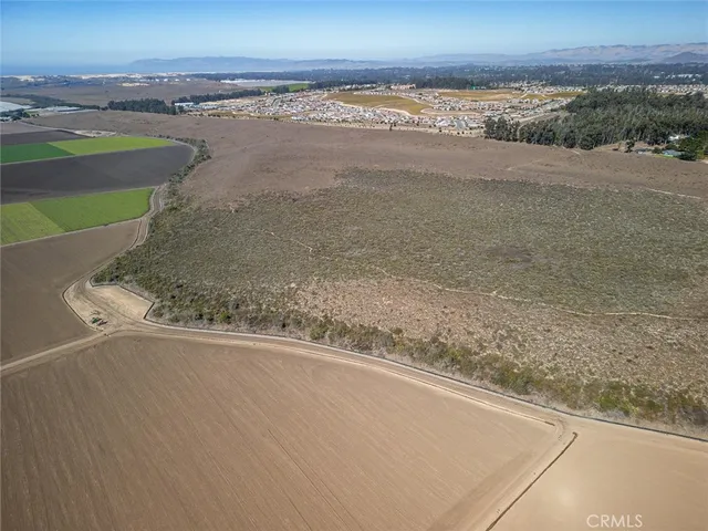 an aerial view of beach and ocean