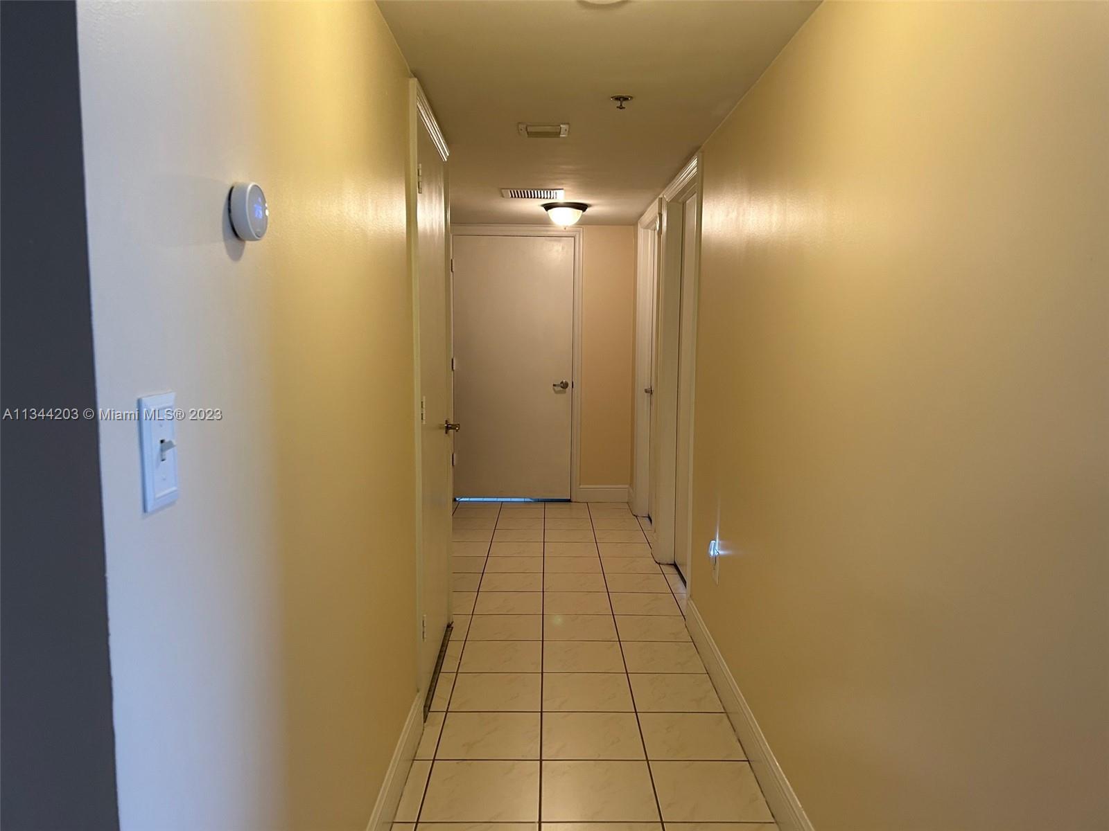 55 East 4th Street, Unit 302 Hialeah, FL 33010 - Photo 17 of 17 a view of a hallway